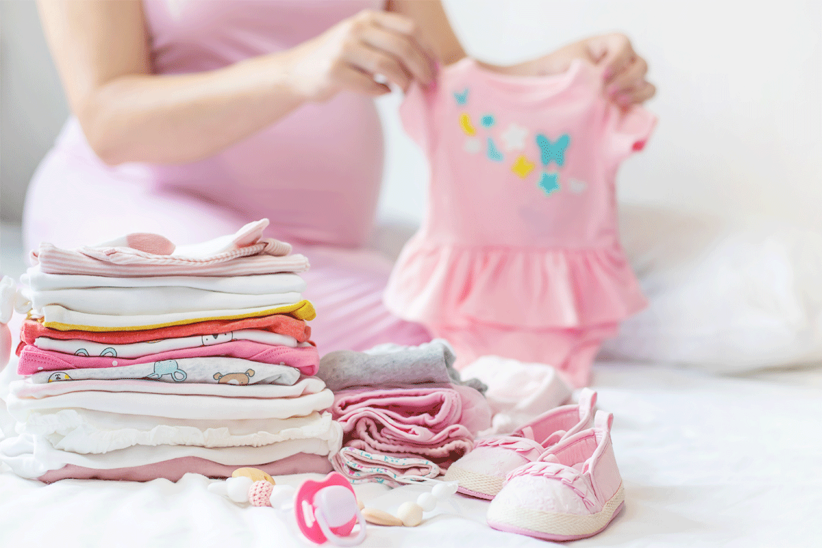 Wat heb je allemaal nodig aan babykleertjes in het begin?